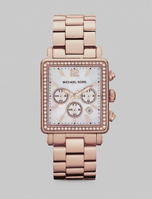 Show your true sparkle in this warm, technical timepiece with a crystal bezel. Quartz movementWater resistant to 5 ATMRectangular rose goldtone stainless steel case, 35mm (1.3) X 32mm (1.2)Crystal bezelMother-of-pearl chronograph dialNumeric and bar hour markersDate display between 4 and 5 o'clockSecond hand Rose goldtone stainless steel link braceletImported Show your true sparkle in this warm, technical timepiece with a crystal bezel. Quartz movementWater resistant to 5 ATMRectangular rose goldtone stainless steel case, 35mm (1.3) X 32mm (1.2)Crystal bezelMother-of-pearl chronograph dialNumeric and bar hour markersDate display between 4 and 5 o'clockSecond hand Rose goldtone stainless steel link braceletImported