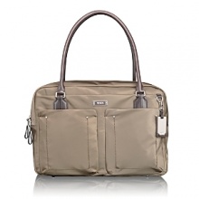 Book your ticket and travel in style with this refined boarding tote, an essential component of the Voyageur collection. Book your ticket and travel in style with this refined boarding tote, an essential component of the Voyageur collection.