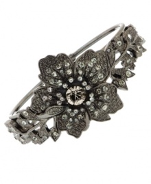 Floral fixation. A beautiful bloom is surrounded by sparkling crystals and glass accents on this eye-catching cuff bracelet from 2028. Crafted in hematite tone mixed metal. Approximate diameter: 2 inches. Floral fixation. A beautiful bloom is surrounded by sparkling crystals and glass accents on this eye-catching cuff bracelet from 2028. Crafted in hematite tone mixed metal. Approximate diameter: 2 inches.