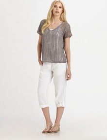 This airy knit with a hint of shimmer, thanks to metallic thread, also features a feminine neckline and beloved fit.V-neckShort sleevesPull-on styleAbout 24 from shoulder to hem83% linen/16% metallic thread/1% cottonHand washImported of Italian fabric Model shown is 5'10 (177cm) wearing US size Small. This airy knit with a hint of shimmer, thanks to metallic thread, also features a feminine neckline and beloved fit.V-neckShort sleevesPull-on styleAbout 24 from shoulder to hem83% linen/16% metallic thread/1% cottonHand washImported of Italian fabric Model shown is 5'10 (177cm) wearing US size Small.