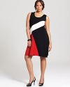 Featuring bold color blocking, this Karen Kane Plus dress lends graphic edge to your everyday style. Sleek black accessories pull the elements together for modern sophistication.