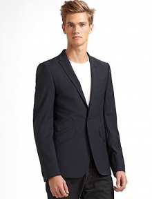 THE LOOKPeaked lapel with button opening One-button front Long sleeves with four button cuffs Single welt pocket at chest Three flap pockets at front Single vent at backTHE MATERIALVirgin wool Cupro liningCARE & ORIGINDry clean Imported