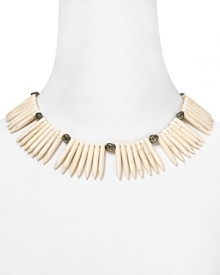 Indulge in decadently dark glamor with this collar necklace from Made Her Think. Crafted from tooth-like resin stations with pyrite skull detailing, it's hauntingly beautiful. Indulge in decadently dark glamor with this collar necklace from Made Her Think. Crafted from tooth-like resin stations with pyrite skull detailing, it's hauntingly beautiful.