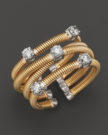 Scattered diamonds set in 14K yellow gold. Scattered diamonds set in 14K yellow gold.