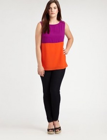 One of the hottest trends of the season, colorblocking makes this sleeveless top truly stand out from the crowd. Round neckSleevelessSide slitsButton closure at keyhole backPull-on style About 29 from shoulder to hemViscoseDry cleanImported One of the hottest trends of the season, colorblocking makes this sleeveless top truly stand out from the crowd. Round neckSleevelessSide slitsButton closure at keyhole backPull-on style About 29 from shoulder to hemViscoseDry cleanImported