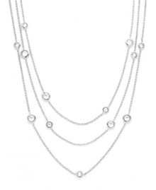 Inch upon inch of brilliant sparkle. Eliot Danori's elegantly-layered necklace highlights bezel-set cubic zirconias (2-3/4 ct. t.w.) strung from delicate chains. Crafted from silver tone mixed metal. Approximate length: 54 inches. Inch upon inch of brilliant sparkle. Eliot Danori's elegantly-layered necklace highlights bezel-set cubic zirconias (2-3/4 ct. t.w.) strung from delicate chains. Crafted from silver tone mixed metal. Approximate length: 54 inches.