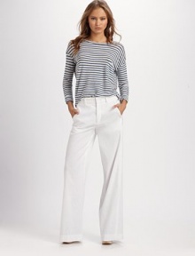 Striped cotton boatneck with dropped shoulders, three-quarter sleeves and a curved hem that hits below the hips. BoatneckDropped shouldersLong sleevesFront patch pocketCurved hem hits below the hipsCottonMachine washImported Striped cotton boatneck with dropped shoulders, three-quarter sleeves and a curved hem that hits below the hips. BoatneckDropped shouldersLong sleevesFront patch pocketCurved hem hits below the hipsCottonMachine washImported