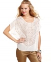 An intricate design of metallic studs brings tribal sensibility to XOXO's wispy, short-sleeve top!