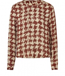 A super-chic abstract houndstooth print covers this silk top from Burberry Brit - Round neck, long sleeves, relaxed silhouette, slightly cropped, all-over print - Pair with high-waist skinnies or a pencil skirt and heels A super-chic abstract houndstooth print covers this silk top from Burberry Brit - Round neck, long sleeves, relaxed silhouette, slightly cropped, all-over print - Pair with high-waist skinnies or a pencil skirt and heels