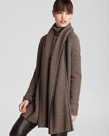 Leather piping lends an ultra-luxe feel to this oversize Vince sweater--a can't-live-without staple come fall. Leather piping lends an ultra-luxe feel to this oversize Vince sweater--a can't-live-without staple come fall.