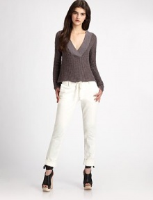 Casual-chic style with an attached hood, oversized v-neck and dropped shoulders. Attached hoodRibbed v-neckDropped shouldersLong sleeves70% cotton/30% linenDry cleanImportedModel shown is 5'9½ (176cm) wearing US size 4. Casual-chic style with an attached hood, oversized v-neck and dropped shoulders. Attached hoodRibbed v-neckDropped shouldersLong sleeves70% cotton/30% linenDry cleanImportedModel shown is 5'9½ (176cm) wearing US size 4.
