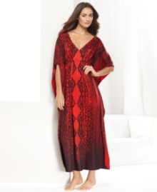 One World's Maxi caftan is loose, flowy, and fancy. With an elegant lace print and an easy v-neck, this floor-length style is nothing but comfortable. One World's Maxi caftan is loose, flowy, and fancy. With an elegant lace print and an easy v-neck, this floor-length style is nothing but comfortable.