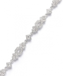 Treat yourself to a little luxury. Eliot Danori's dramatic Diadem Bracelet features a unique diamond-shaped crisscross pattern accented by sparkling crystals. Crafted in silver tone mixed metal. Approximate length: 7-1/4 inches. Treat yourself to a little luxury. Eliot Danori's dramatic Diadem Bracelet features a unique diamond-shaped crisscross pattern accented by sparkling crystals. Crafted in silver tone mixed metal. Approximate length: 7-1/4 inches.