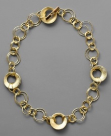 Give your look a touch of fun with this glitzy, goldtone multiple hoop necklace from AK Anne Klein. In mixed metal. Approximate length: 17 inches. Give your look a touch of fun with this glitzy, goldtone multiple hoop necklace from AK Anne Klein. In mixed metal. Approximate length: 17 inches.