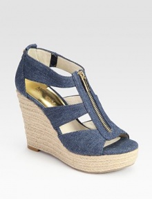 Comfy denim classic with an espadrille wedge and exposed front zipper. Hemp wedge, 4 (100mm)Hemp platform, 1 (25mm)Compares to a 3 heel (75mm)Denim upperLeather liningRubber solePadded insoleImported Comfy denim classic with an espadrille wedge and exposed front zipper. Hemp wedge, 4 (100mm)Hemp platform, 1 (25mm)Compares to a 3 heel (75mm)Denim upperLeather liningRubber solePadded insoleImported