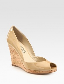 Glossy patent leather silhouette has a peep toe and towering cork wedge. Cork wedge, 4 (100mm)Cork platform, ½ (15mm)Compares to a 3½ heel (90mm)Patent leather upperLeather lining and solePadded insoleImported Glossy patent leather silhouette has a peep toe and towering cork wedge. Cork wedge, 4 (100mm)Cork platform, ½ (15mm)Compares to a 3½ heel (90mm)Patent leather upperLeather lining and solePadded insoleImported