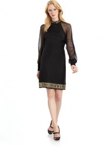THE LOOKGolden square accents at necklineChiffon long sleeves with banded cuffsBanded waistGolden accents in varying shapes at hemChiffon backTHE FITAbout 32 from shoulder to hemTHE MATERIAL64% virgin wool/36% silkCARE & ORIGINDry cleanMade in ItalyModel shown is 5'10 (177cm) wearing US size 4. THE LOOKGolden square accents at necklineChiffon long sleeves with banded cuffsBanded waistGolden accents in varying shapes at hemChiffon backTHE FITAbout 32 from shoulder to hemTHE MATERIAL64% virgin wool/36% silkCARE & ORIGINDry cleanMade in ItalyModel shown is 5'10 (177cm) wearing US size 4.