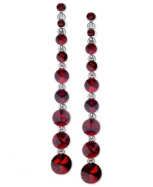 Look radiant in red with this pair of linear earrings from GUESS. Crafted from hematite-tone mixed metal, the earrings dazzle with glass crystal stones. Item comes packaged in a signature GUESS Gift Box. Approximate drop: 4 inches. Look radiant in red with this pair of linear earrings from GUESS. Crafted from hematite-tone mixed metal, the earrings dazzle with glass crystal stones. Item comes packaged in a signature GUESS Gift Box. Approximate drop: 4 inches.