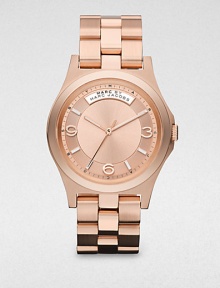 The warm glow of a rose goldtone finish over stainless steel is done in an elegant combination of brushed and polished finishes in this boldly sized bracelet watch.Quartz movementWater resistant to 5 ATMRose goldtone finished stainless steel round case, 40mm diameter (1.57)Smooth bezelRose goldtone sunray dialArabaic numerals and bar hour markersSecond handBrushed and polished rose goldtone finished link braceletDeployant foldover claspImported The warm glow of a rose goldtone finish over stainless steel is done in an elegant combination of brushed and polished finishes in this boldly sized bracelet watch.Quartz movementWater resistant to 5 ATMRose goldtone finished stainless steel round case, 40mm diameter (1.57)Smooth bezelRose goldtone sunray dialArabaic numerals and bar hour markersSecond handBrushed and polished rose goldtone finished link braceletDeployant foldover claspImported