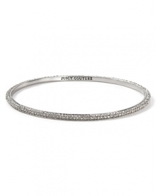 Nod to Juicy Couture's signature glamour with this silver plated bangle, accented by a delicate rim of crystal stones. It's all in the glitz. Nod to Juicy Couture's signature glamour with this silver plated bangle, accented by a delicate rim of crystal stones. It's all in the glitz.