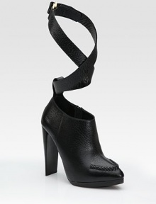 Glossy leather style features braided toe detail and a sassy strap that wraps around the leg and concludes with a buckle. Self-covered heel, 5 (125mm) Platform, 1 (25mm) Compares to a 4 heel (100mm) Shaft, 3½ Leather upper Leather lining Rubber sole Padded insole Made in ItalyOUR FIT MODEL RECOMMENDS ordering one half size up as this style runs small. Glossy leather style features braided toe detail and a sassy strap that wraps around the leg and concludes with a buckle. Self-covered heel, 5 (125mm) Platform, 1 (25mm) Compares to a 4 heel (100mm) Shaft, 3½ Leather upper Leather lining Rubber sole Padded insole Made in ItalyOUR FIT MODEL RECOMMENDS ordering one half size up as this style runs small.