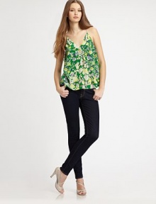 Silk v-neck in a feminine floral print with spaghetti straps and a sporty racerback. V-neckSpaghetti strapsRacerbackSilkDry cleanImportedModel shown is 5'10 (177cm) wearing US size 4. Silk v-neck in a feminine floral print with spaghetti straps and a sporty racerback. V-neckSpaghetti strapsRacerbackSilkDry cleanImportedModel shown is 5'10 (177cm) wearing US size 4.