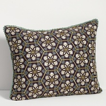 Fashioned in a geometric floral print, complete your garden bedroom setting with this lovely decorative pillow. Fashioned in a geometric floral print, complete your garden bedroom setting with this lovely decorative pillow.