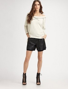 Soft French terry finished with contrast stitching in a slightly oversized pullover.Boatneck Raglan sleeves cropped above wristsAsymmetrical hemAbout 29 from shoulder to hemCottonDry cleanImported Soft French terry finished with contrast stitching in a slightly oversized pullover.Boatneck Raglan sleeves cropped above wristsAsymmetrical hemAbout 29 from shoulder to hemCottonDry cleanImported