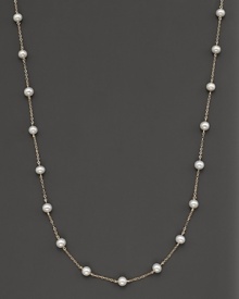 Beaded 14 Kt. white gold necklace with fresh water pearl stations. Beaded 14 Kt. white gold necklace with fresh water pearl stations.