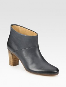 Glistening leather pull-on style with asymmetrical stitching and a stacked heel. Stacked heel, 3 (75mm)Leather upperPull-on styleLeather lining and solePadded insoleMade in ItalyOUR FIT MODEL RECOMMENDS ordering true size. Glistening leather pull-on style with asymmetrical stitching and a stacked heel. Stacked heel, 3 (75mm)Leather upperPull-on styleLeather lining and solePadded insoleMade in ItalyOUR FIT MODEL RECOMMENDS ordering true size.