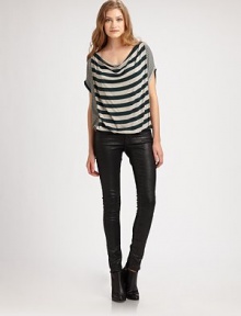 Multi-directional stripes, slouchy short sleeves and an elasticized hem enliven this sporty jersey top. Modified cowlneckShort sleevesElastic waistband96% rayon/4% spandexDry cleanMade in USAModel shown is 5'11 (178cm) wearing US size Small. Multi-directional stripes, slouchy short sleeves and an elasticized hem enliven this sporty jersey top. Modified cowlneckShort sleevesElastic waistband96% rayon/4% spandexDry cleanMade in USAModel shown is 5'11 (178cm) wearing US size Small.