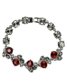 Code red. Stunning Siam and black glass accents are presented perfectly on Givenchy's fashionable flex bracelet. Set in hematite tone mixed metal, it's an alluring accent for day or evening. Approximate length: 7-1/4 inches. Code red. Stunning Siam and black glass accents are presented perfectly on Givenchy's fashionable flex bracelet. Set in hematite tone mixed metal, it's an alluring accent for day or evening. Approximate length: 7-1/4 inches.