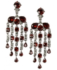 Rich and resplendent. A dramatic duo of Siam and black glass accents add a dazzling decorative touch to Givenchy's chandelier earrings. You'll be sure to turn heads whenever you wear them! Set in hematite tone mixed metal. Approximate drop: 3 inches. Rich and resplendent. A dramatic duo of Siam and black glass accents add a dazzling decorative touch to Givenchy's chandelier earrings. You'll be sure to turn heads whenever you wear them! Set in hematite tone mixed metal. Approximate drop: 3 inches.