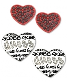 Mix and match with these lovely stud earrings from GUESS! This darling duo set features two heart-shaped studs -- one with a jet epoxy logo and stone accents, the other sprayed red with black crystals. Crafted in silver tone mixed metal. Approximate diameter: 1 inch. Mix and match with these lovely stud earrings from GUESS! This darling duo set features two heart-shaped studs -- one with a jet epoxy logo and stone accents, the other sprayed red with black crystals. Crafted in silver tone mixed metal. Approximate diameter: 1 inch.