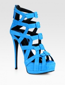 Sexy cutouts define this platform design in buttery suede with a piercing stiletto heel. Self-covered heel, 5¼ (130mm)Covered platform, 1¾ (45mm)Compares to a 4½ heel (115mm)Suede upperFront snap closuresBack zipLeather lining and solePadded insoleMade in Italy Sexy cutouts define this platform design in buttery suede with a piercing stiletto heel. Self-covered heel, 5¼ (130mm)Covered platform, 1¾ (45mm)Compares to a 4½ heel (115mm)Suede upperFront snap closuresBack zipLeather lining and solePadded insoleMade in Italy