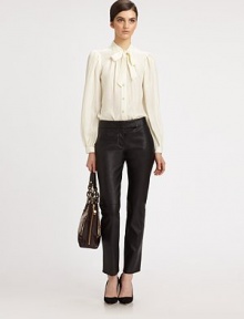 Show some urban attitude in lustrous leather pants with cropped-leg construction and back besom pockets. Button closureZip flyBack besom pocketsRise, about 8Inseam, about 28LeatherDry clean with leather specialistMade in USA of imported fabricModel shown is 5'10 (177cm) wearing US size 2. Show some urban attitude in lustrous leather pants with cropped-leg construction and back besom pockets. Button closureZip flyBack besom pocketsRise, about 8Inseam, about 28LeatherDry clean with leather specialistMade in USA of imported fabricModel shown is 5'10 (177cm) wearing US size 2.
