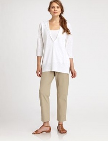 Featuring a deep v-neckline, this hooded tunic is made from a luxurious blend of linen and cotton.Attached hoodThree-quarter sleevesPull-on styleRibbed trimSide slitsAbout 30 from shoulder to hem56% linen/44% cottonDry cleanImported Model shown is 5'10 (177cm) wearing US size Small. Featuring a deep v-neckline, this hooded tunic is made from a luxurious blend of linen and cotton.Attached hoodThree-quarter sleevesPull-on styleRibbed trimSide slitsAbout 30 from shoulder to hem56% linen/44% cottonDry cleanImported Model shown is 5'10 (177cm) wearing US size Small.