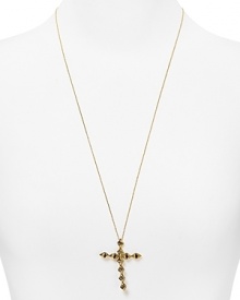 Cast in 14-karat gold and gunmetal plate, this House of Harlow 1960 necklace styles edgy glamor with its double sided cross pendant. Cast in 14-karat gold and gunmetal plate, this House of Harlow 1960 necklace styles edgy glamor with its double sided cross pendant.