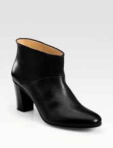 Rich, burnished leather in a sleek round toe silhouette. Stacked heel, 3 (75mm) Leather upper Leather lining and sole Padded insole Made in ItalyOUR FIT MODEL RECOMMENDS ordering true size. Rich, burnished leather in a sleek round toe silhouette. Stacked heel, 3 (75mm) Leather upper Leather lining and sole Padded insole Made in ItalyOUR FIT MODEL RECOMMENDS ordering true size.