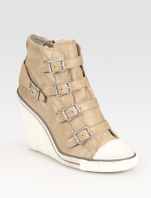 Buckle hardware, pebbled leather and a wide wedge modernize this sporty classic. Self-covered wedge, 3 (75mm)Leather upperLeather liningRubber solePadded insoleImported Buckle hardware, pebbled leather and a wide wedge modernize this sporty classic. Self-covered wedge, 3 (75mm)Leather upperLeather liningRubber solePadded insoleImported