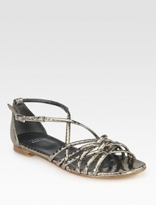Metallic snake-embossed leather with a strappy front and an adjustable ankle strap. Snake-embossed leather upperLeather liningBuffed leather solePadded insoleImportedOUR FIT MODEL RECOMMENDS ordering one half size down as this style runs large. Metallic snake-embossed leather with a strappy front and an adjustable ankle strap. Snake-embossed leather upperLeather liningBuffed leather solePadded insoleImportedOUR FIT MODEL RECOMMENDS ordering one half size down as this style runs large.