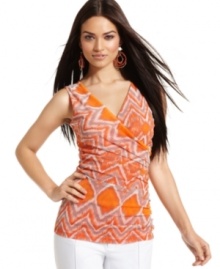 Wrap yourself in vivid color with INC! This sleeveless tank features a curve-hugging silhouette and the season's hottest ikat print. Wrap yourself in vivid color with INC! This sleeveless tank features a curve-hugging silhouette and the season's hottest ikat print.