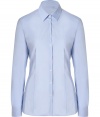 Detailed in a flattering blend of stretch cotton, Hugos feminine fitted shirt is a smart investment perfect for setting the foundation for workweek looks - Classic collar, long sleeves, buttoned cuffs, button-down front, tailored seaming, shirttail hemline - Figure-hugging cut - Wear with practically anything for a clean, tailored look