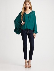 Oversized bell sleeves bring the drama to this smocked silk topper.Split V necklineSmocked detailsRuffled trim at bell sleevesPullover styleAbout 22 from shoulder to hemSilkDry cleanImported Oversized bell sleeves bring the drama to this smocked silk topper.Split V necklineSmocked detailsRuffled trim at bell sleevesPullover styleAbout 22 from shoulder to hemSilkDry cleanImported