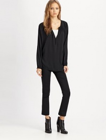 Lustrous split crewneck in a silk-rich blend with long bell sleeves and buttoned cuffs. Split crewneckHook-and-eye closuresLong bell sleevesButtoned cuffs95% silk/5% LycraDry cleanImportedModel shown is 5'8 (174cm) wearing US size Small. Lustrous split crewneck in a silk-rich blend with long bell sleeves and buttoned cuffs. Split crewneckHook-and-eye closuresLong bell sleevesButtoned cuffs95% silk/5% LycraDry cleanImportedModel shown is 5'8 (174cm) wearing US size Small.