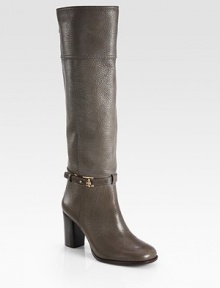 Rich pebble-grain leather forms this towering design, with a wrap-around ankle strap and stacked heel. Stacked heel, 3¼ (80mm)Shaft, 17¼Leg circumference, 14Leather upperWrap-around ankle strap with metal tab closureBack zipLeather lining and solePadded insoleImportedThis style runs true to size. We recommend ordering your usual size for a standard fit. Rich pebble-grain leather forms this towering design, with a wrap-around ankle strap and stacked heel. Stacked heel, 3¼ (80mm)Shaft, 17¼Leg circumference, 14Leather upperWrap-around ankle strap with metal tab closureBack zipLeather lining and solePadded insoleImportedThis style runs true to size. We recommend ordering your usual size for a standard fit.