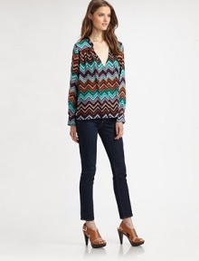 Floaty silk v-neck in an undeniably chic zig-zag print with long bishop sleeves and self ties at the neckline. V-neck with self tiesLong bishop sleevesButtoned cuffsSilk georgetteDry cleanImportedModel shown is 5'10 (177cm) wearing US size Small. Floaty silk v-neck in an undeniably chic zig-zag print with long bishop sleeves and self ties at the neckline. V-neck with self tiesLong bishop sleevesButtoned cuffsSilk georgetteDry cleanImportedModel shown is 5'10 (177cm) wearing US size Small.