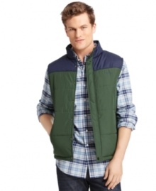Bulk up on scholastic style with this lightweight varsity puffer vest from Izod.