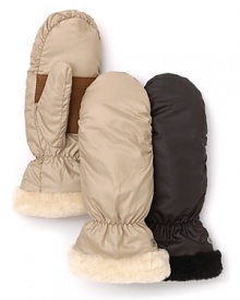 Genuine shearling lends warmth and style to these winter-essential mittens from UGG® Australia. Genuine shearling lends warmth and style to these winter-essential mittens from UGG® Australia.