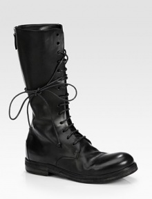 Wrap-around laces add urban-cool to this always fashionable leather silhouette. Stacked heel, 1¼ (30mm)Shaft, 11½Leg circumference, 11½Leather upperBack zipLeather lining and solePadded insoleMade in ItalyOUR FIT MODEL RECOMMENDS ordering one size up as this style runs small. Wrap-around laces add urban-cool to this always fashionable leather silhouette. Stacked heel, 1¼ (30mm)Shaft, 11½Leg circumference, 11½Leather upperBack zipLeather lining and solePadded insoleMade in ItalyOUR FIT MODEL RECOMMENDS ordering one size up as this style runs small.